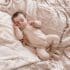 fodla asleeping wearing natural organic cotton baby romper