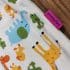 picture of organic cotton baby sleeping bag with animals print. picture of the logo