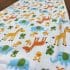 picture of organic cotton baby sleeping bag with animals print. picture of the logo